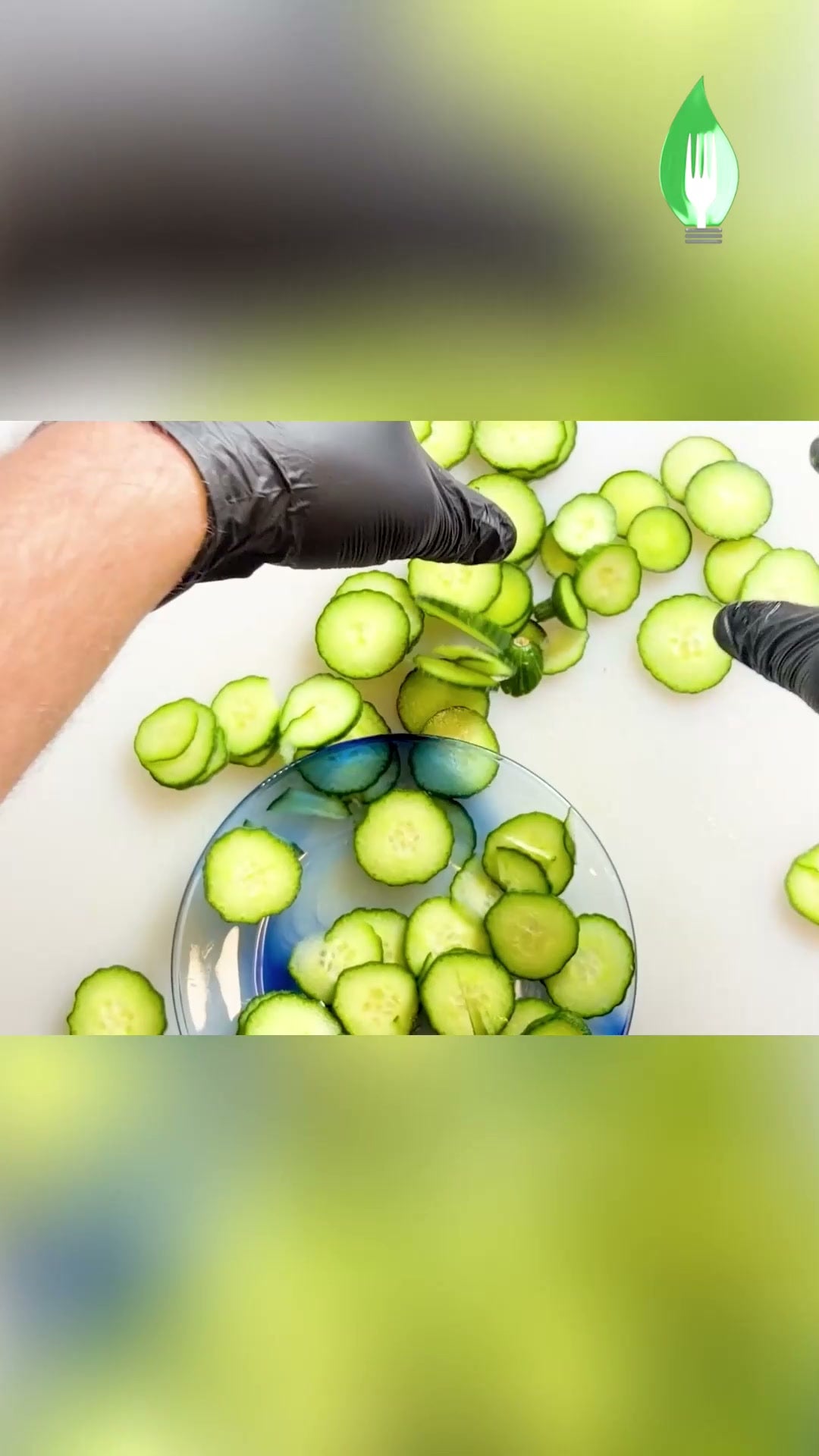 Thin cucumber coins arranged on a blue plate