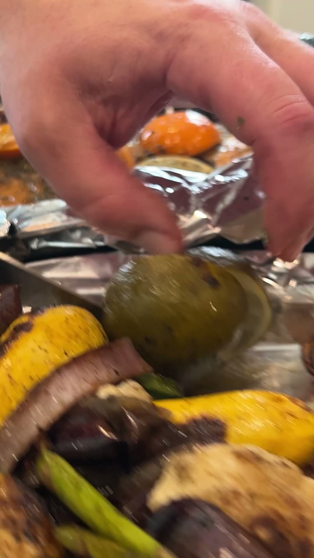Grilled vegetables and squash lifted from a foil pack