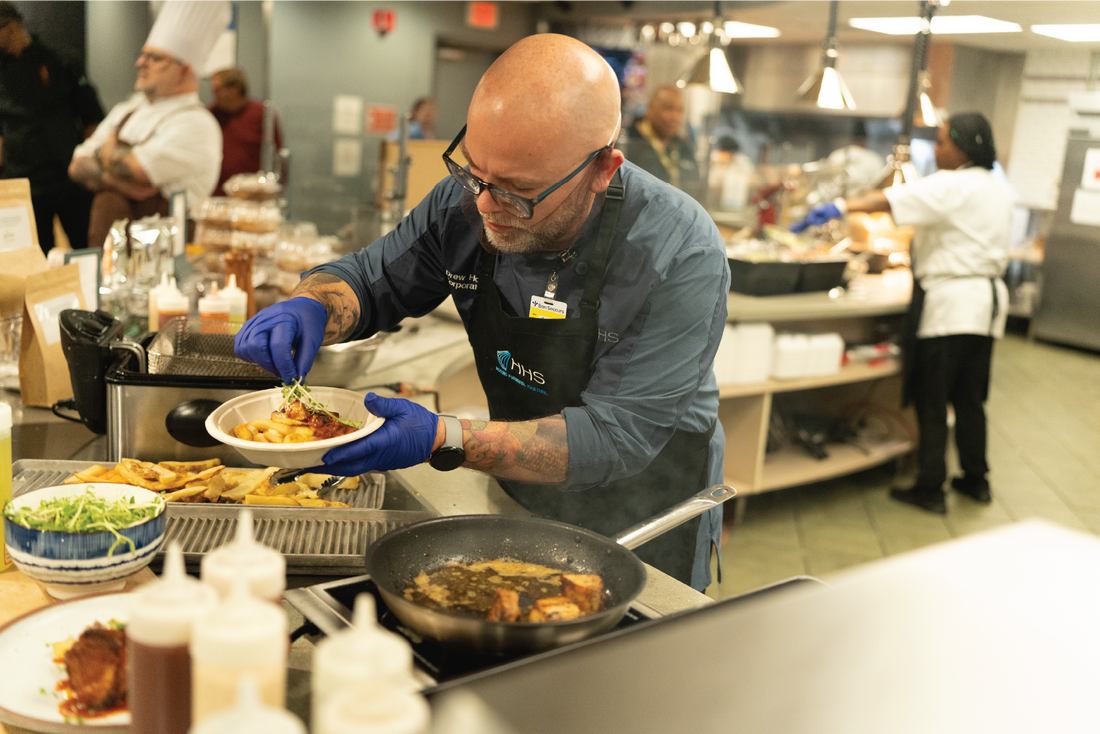 Chef Darin Leonardson plating in the kitchen